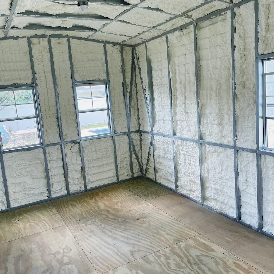 Closed-cell spray foam insulation applied to wall cavities in a residential project in Paragould